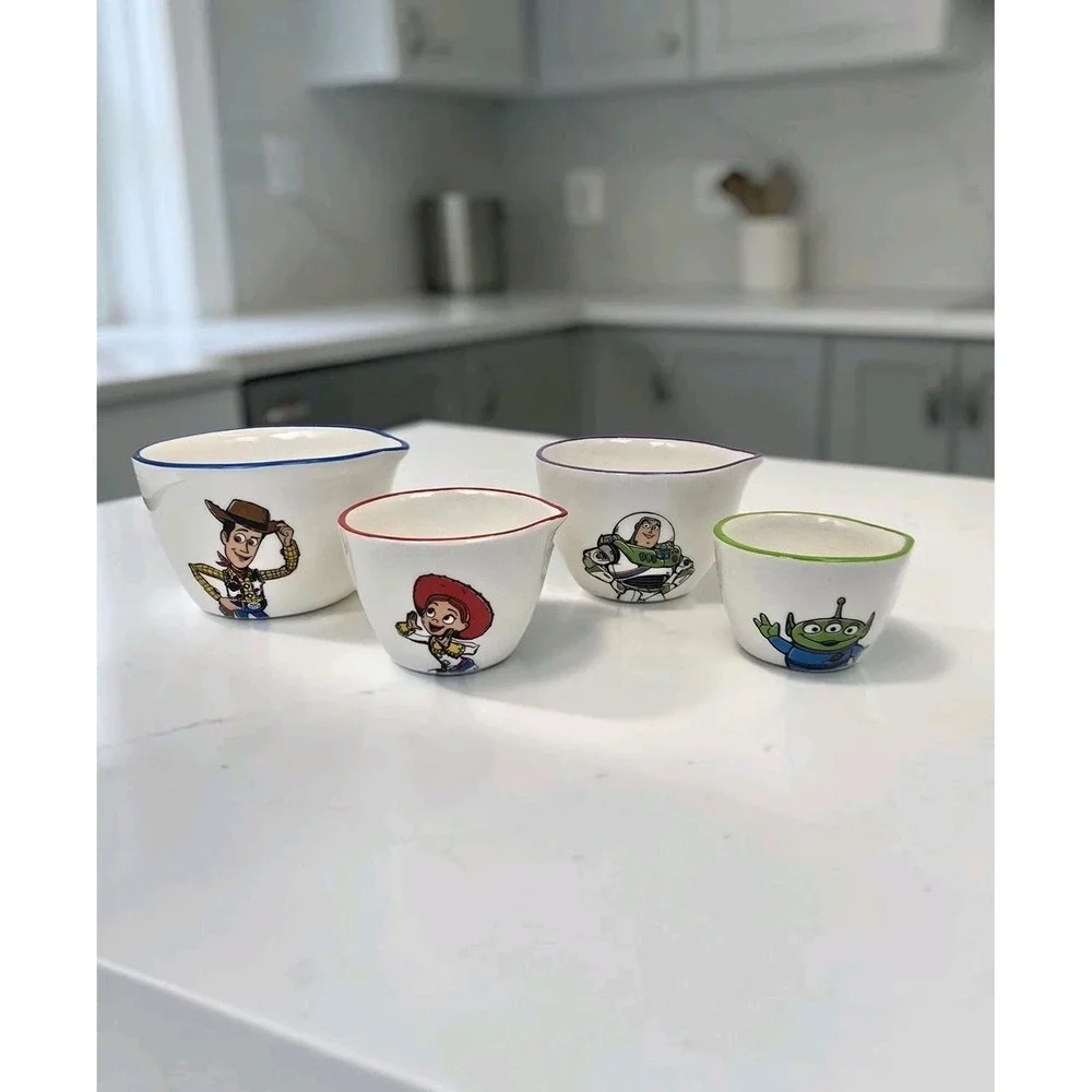 Rae Dunn Disney Pixar Toy Story  Measuring Cups Set Of 4 Woody Buzz Jessie Alien